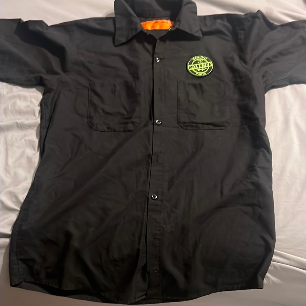 Black Button-Up Shirt with Green Logo
